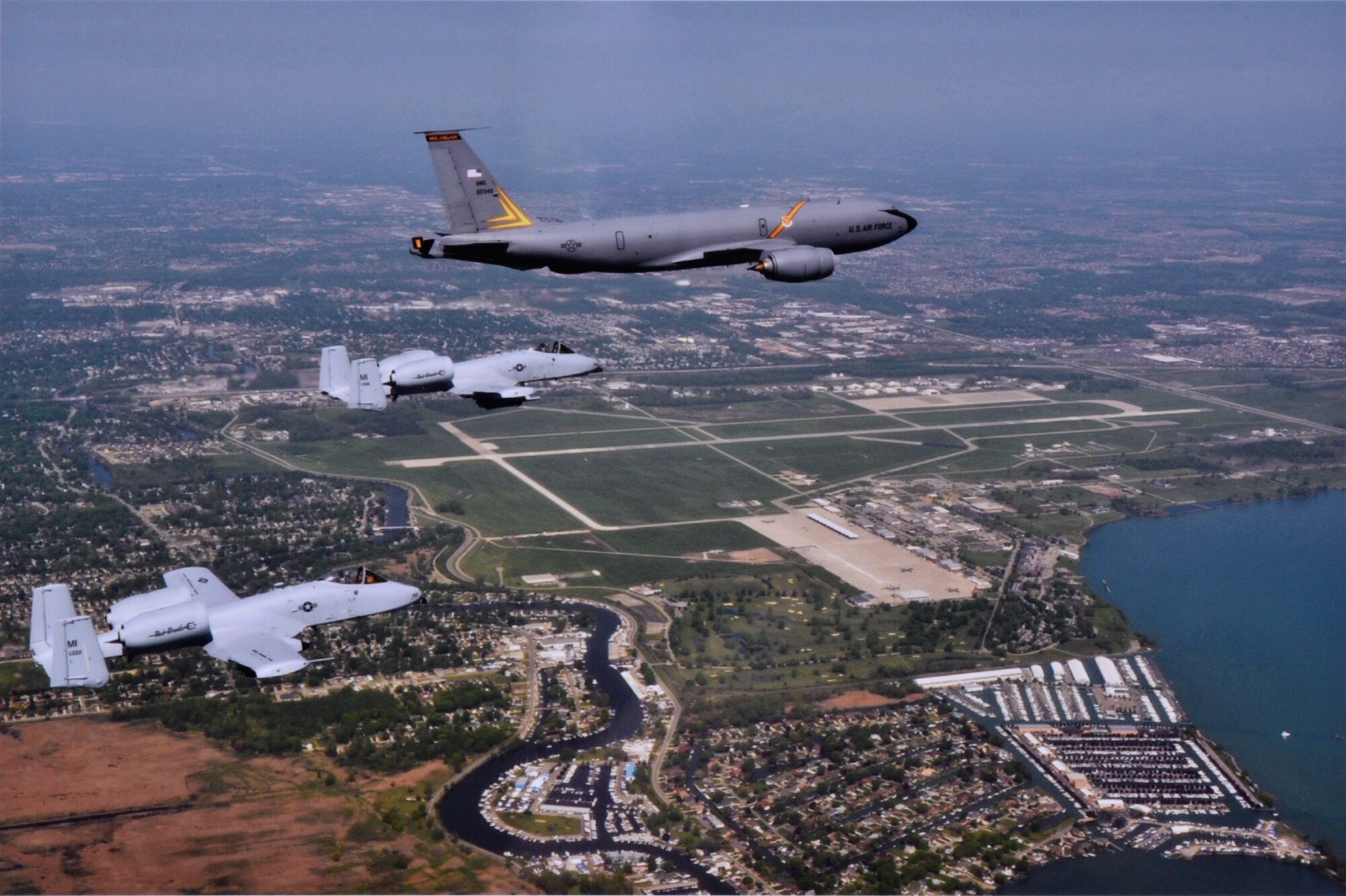 A KC-135 Stratotanker and two A-10 Thunderbolt IIs from the 127th Wing fly over the wing's home station of Selfridge Air National Guard Base, Mich., May 24, 2016. The 127th Wing has been awarded the Spaatz Trophy by the National Guard Association of the United States, which recognizes the top flying unit in the country in the National Guard. (U.S. Air National Guard photo by Master Sgt. Elizabeth Holliker)
