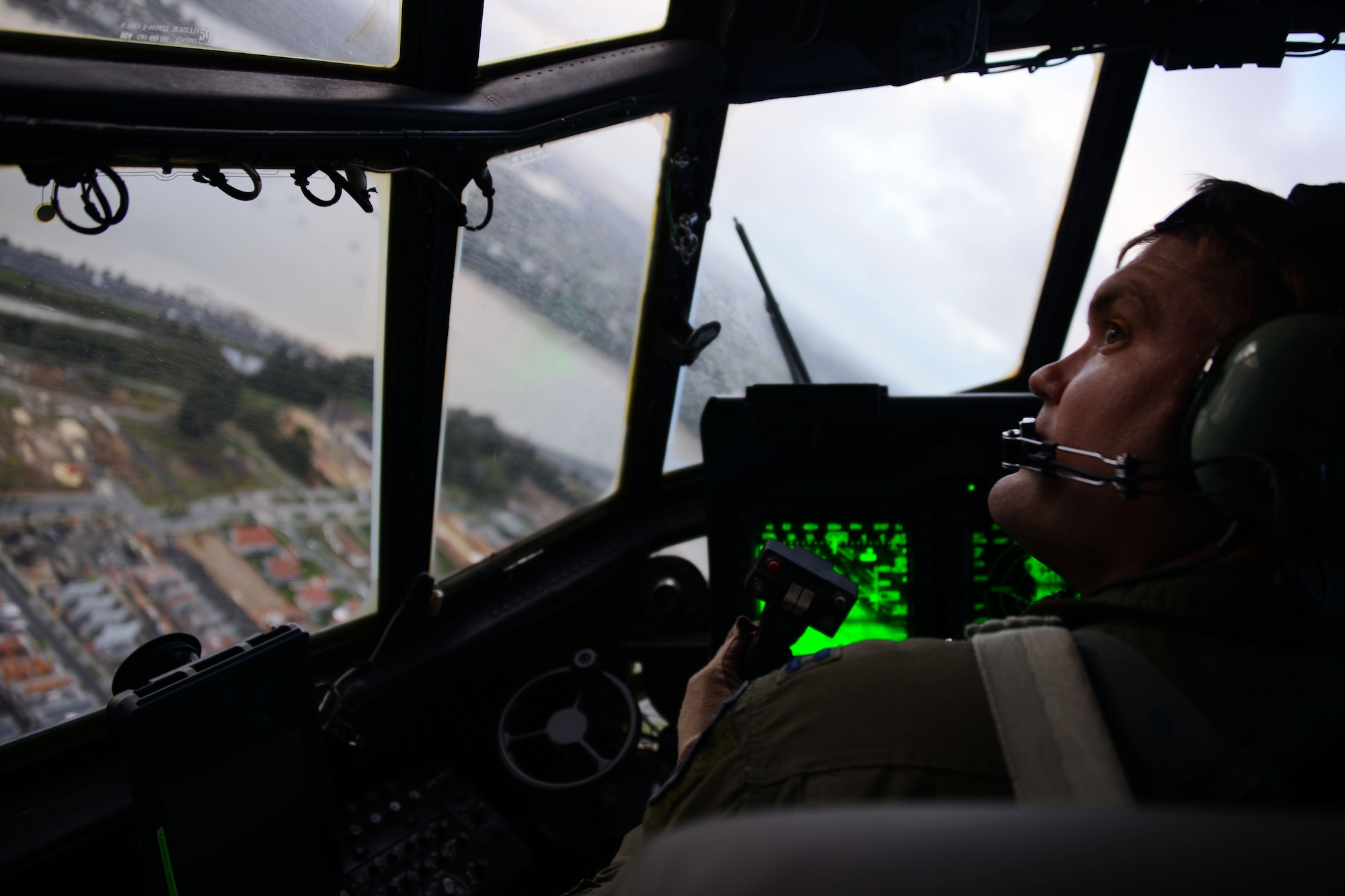 A 1st Special Operations Squadron pilot flies an MC-130H Combat Talon II and puts eyes on a Royal New Zealand Air Force C-130 Hercules during a dissimilar formation low level flight June 23, 2016.  Members from the 353rd Special Operations Group participated in Exercise Teak Net June 12 through June 30 in Whenuapai, New Zealand. During the exercise, members from both the New Zealand Defense Force and U.S. Air Force worked together to conduct personnel and equipment air drops together while exchanging new techniques. (U.S. Air Force photo by Master Sgt. Kristine Dreyer)