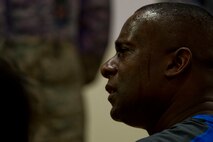 Retired U.S. Air Force Chief Master Sgt. Juan Lewis, known as the Fired Up Chief, speaks to NCOs during a Tier II private organization meeting at the Brick House on Spangdahlem Air Base, Germany, July 12, 2016. Lewis spoke to NCOs about PEP, meaning pride, enthusiasm and passion, as part of his pep rally presentation. (U.S. Air Force Photo by Staff Sgt. Joe W. McFadden/Released)