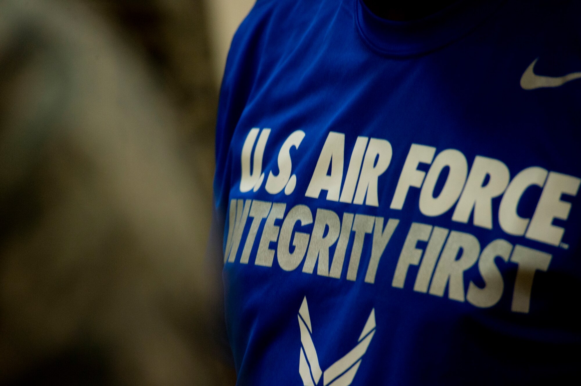 An Air Force logo is displayed on the shirt belonging to retired U.S. Air Force Chief Master Sgt. Juan Lewis, known as the Fired Up Chief, as he speaks to NCOs during a Tier II private organization meeting at the Brick House on Spangdahlem Air Base, Germany, July 12, 2016. Lewis spoke to NCOs about PEP, meaning pride, enthusiasm and passion, as part of his pep rally presentation. (U.S. Air Force Photo by Staff Sgt. Joe W. McFadden/Released)