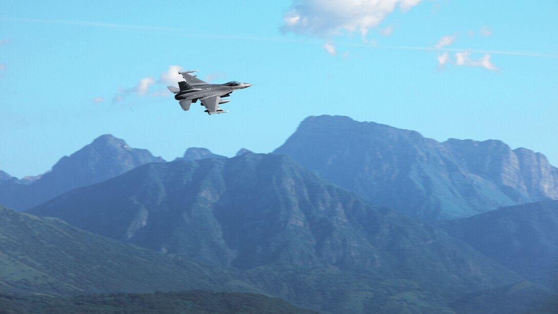 An F-16 Fighting Falcon takes off, July 6, 2016, from Aviano Air Base, Italy, for Nellis Air Force Base, Nev., for Exercise Red Flag 16-3. Red Flag is a realistic combat-training exercise that helps pilots and maintainers improve their capabilities. (U.S. Air Force photo by Senior Airman Areca T. Bell/Released)