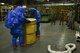U.S. Air Force Chief Master Sgt. Vegas Clark, 39th Air Base Wing command chief, and Staff Sgt. Joshua Bartley, 39th Civil Engineer Squadron (CES) emergency management journeyman, secure a barrel of liquid that was simulated spilled July 13, 2016, at Incirlik Air Base, Turkey. The 39th CES readiness and emergency management flight is responsible for preparing for, responding to, and recovering from any incident that occurs on Incirlik. (U.S. Air Force photo by Tech. Sgt. Caleb Pierce)