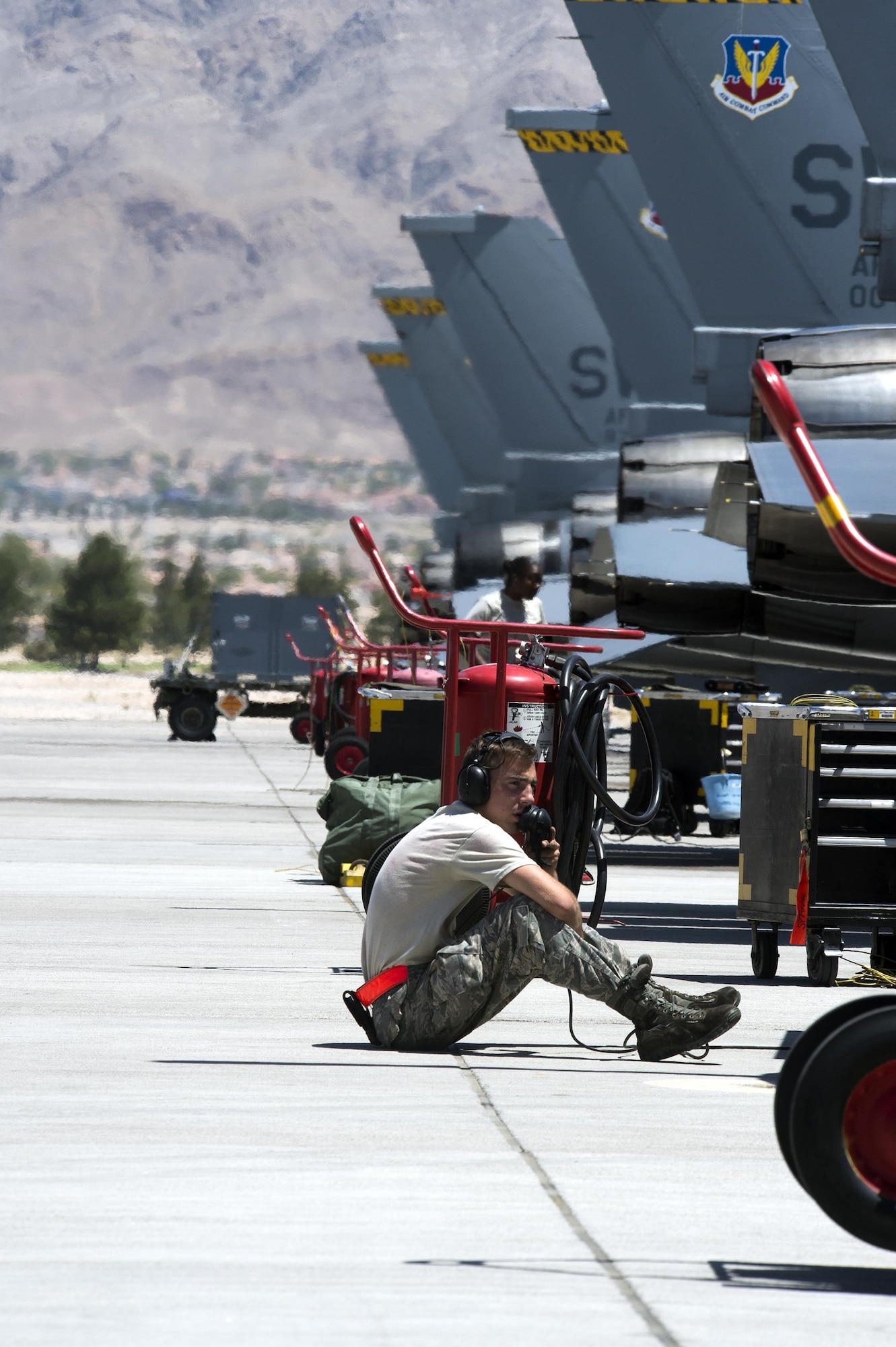 Airman 1st Class Shawn Kelly, 79th Aircraft Maintenance Unit crew chief, prepares an F-16 Fighting Falcon for a flight mission during Red Flag 16-3 at Nellis Air Force Base, Nevada, Monday, July 11, 2016. Although the exercise will test all participating units, 16-3 will provide a deeper understanding on space and cyber systems capabilities and how they contribute to the multi-domain aspect of the operation. (U.S. Air Force photo/Tech. Sgt. Julius Delos Reyes)