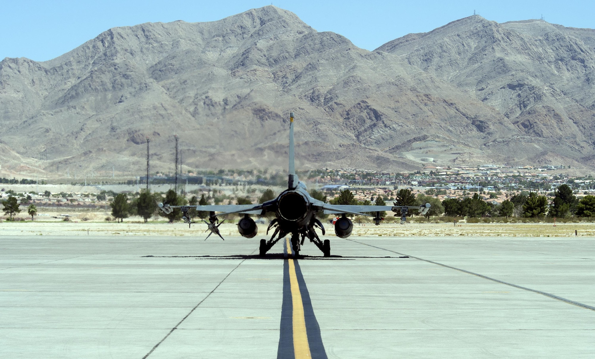 A 79th Fighter Squadron F-16 Fighting Falcon from Shaw Air Force Base, South Carolina, taxis on the flightline during Red Flag 16-3 at Nellis Air Force Base, Nevada, Monday, July 11, 2016. Red Flag is the service’s premier air-to-air combat training exercise and one of a series of advanced training programs administered by the U.S. Air Force Warfare Center and executed through the 414th Combat Training Squadron. (U.S. Air Force photo/Tech. Sgt. Julius Delos Reyes)