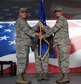 Maj. Gen. John C. Flournoy Jr., 4th Air Force commander, receives the guidon from Col. Craig B. Shenkenberg, outgoing commander of the 916th Air Refueling Wing, during a change of command ceremony, July 10, 2016, at Seymour Johnson Air Force Base, North Carolina. Flournoy presided over the ceremony in which Shenkenberg relinquished command of the 916th ARW to Col. Eric R. Jenkins, formally the vice wing commander of the 507th ARW, Tinker AFB, Oklahoma. (U.S. Air Force Photo/Senior Airman Jeramy Moore)