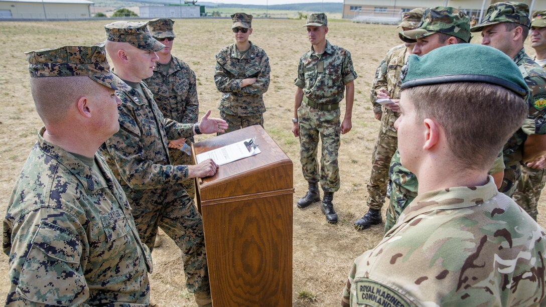 U.S. Marine Corps Capt. Kirk R. Steinhorst, the commander of Combined Arms Company, Black Sea Rotational Force, welcomes members of each nation to Exercise Platinum Lion 16-4 at Novo Selo Training Area, Bulgaria, July 11, 2016. Platinum Lion is a large scale exercise where nine NATO and partner nations came together for a multi-national, live-fire exercise aimed to strengthen regional defense.