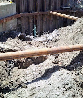 Support of excavation installed; excavation of hole has begun; one of the existing 72” culverts selectively demolished to investigate its condition – early August 2015.