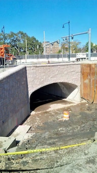 Note the granite veneer installed on the precast culvert and the wingwall that cannot be completed until the existing twin 72” culverts are removed – mid October 2015.