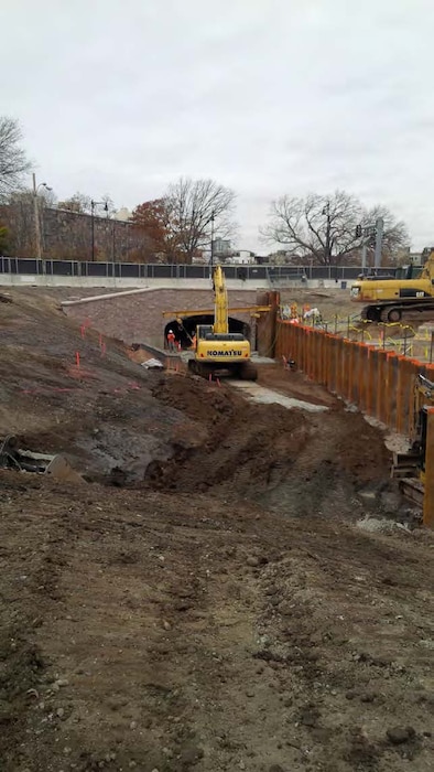 Excavation and shaping of the right (looking downstream) bank of the new river channel downstream of the new Riverway Culvert – mid November 2015.