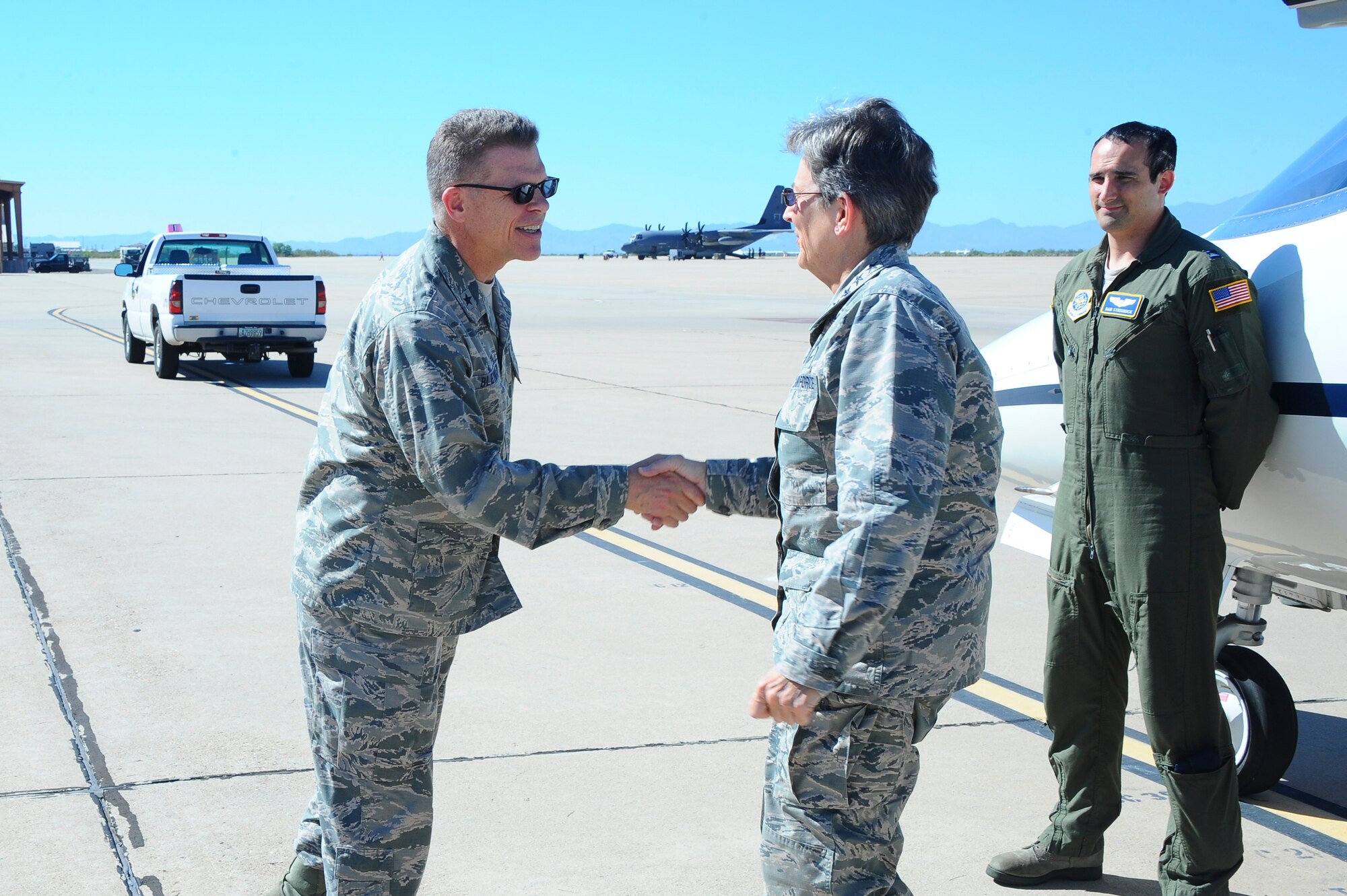U.S. Air Force Brigadier General Steven Bleymaier, commander of Ogden Air Logistics Complex, greets General Ellen Pawlikowski, commander of Air Force Materiel Command, at Davis-Monthan Air Force Base, Ariz., July 12, 2016. The mission of the Air Force Materiel Command is to 
deliver and support agile war-winning capabilities. (U.S. Air Force photo by Airman 1st Class Mya M. Crosby/Released)
