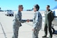 U.S. Air Force Brigadier General Steven Bleymaier, commander of Ogden Air Logistics Complex, greets General Ellen Pawlikowski, commander of Air Force Materiel Command, at Davis-Monthan Air Force Base, Ariz., July 12, 2016. The mission of the Air Force Materiel Command is to 
deliver and support agile war-winning capabilities. (U.S. Air Force photo by Airman 1st Class Mya M. Crosby/Released)
