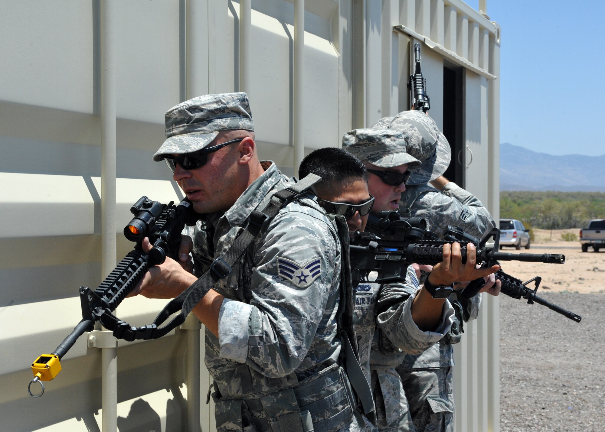 720th Security Forces Squadron members train in triple-digit heat during a drill weekend at Davis-Monthan Air Force Base, Ariz., June 4. They work alongside the 943rd Rescue Group to support active-duty and Air Force Reserve missions. Their parent unit is the 920th Mission Support Group at Patrick Air Force Base, Fla. (U.S. Air Force photo by Tech. Sgt. Carolyn Herrick)