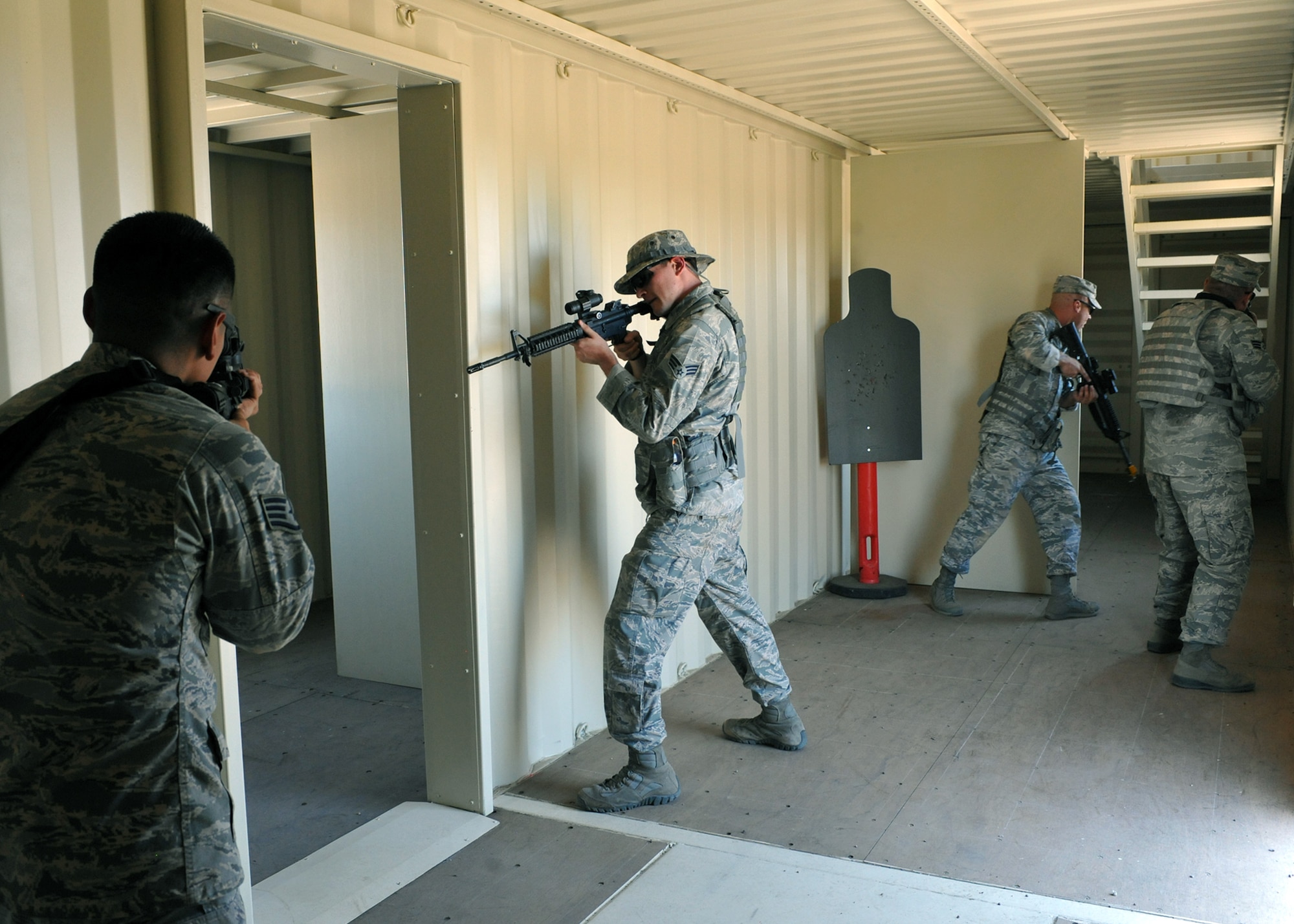 720th Security Forces Squadron members train in triple-digit heat during a drill weekend at Davis-Monthan Air Force Base, Ariz., June 4. They work alongside the 943rd Rescue Group to support active-duty and Air Force Reserve missions. Their parent unit is the 920th Mission Support Group at Patrick Air Force Base, Fla. (U.S. Air Force photo by Tech. Sgt. Carolyn Herrick)