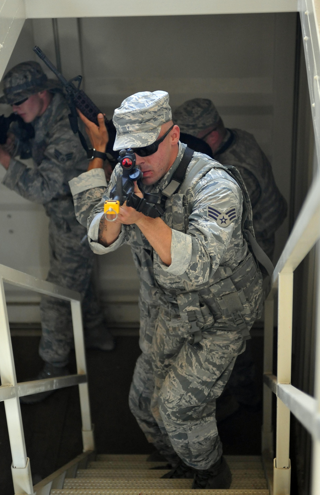 720th Security Forces Squadron members train in triple-digit heat during a drill weekend at Davis-Monthan Air Force Base, Ariz., June 4. They work alongside the 943rd Rescue Group to support active-duty and Air Force Reserve missions. Their parent unit is the 920th Mission Support Group at Patrick Air Force Base, Fla. (U.S. Air Force photo by Tech. Sgt. Carolyn Herrick)