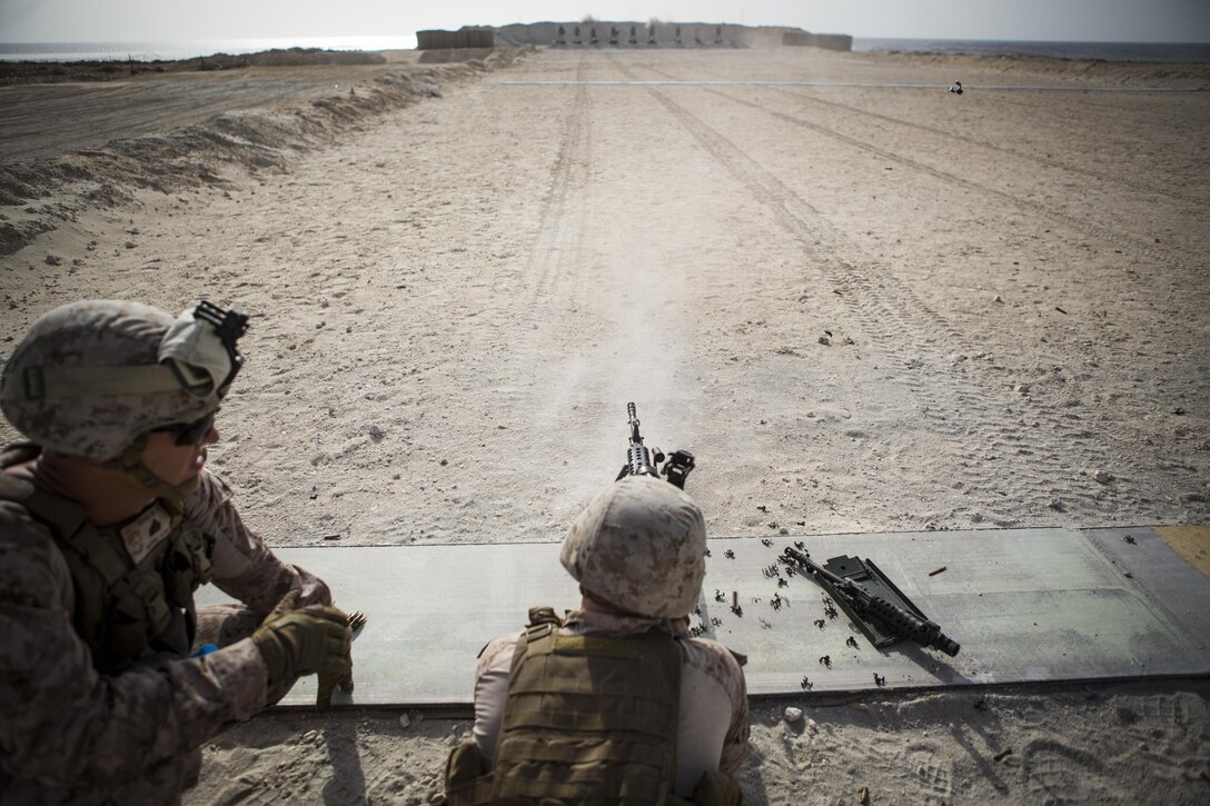 U.S. Marine Corps Cpl. Kyle Hancock, a fire team leader with Company C, Marine Wing Support Squadron 373, Special Purpose Marine Air Ground Task Force - Crisis Response - Central Command 16.2, fires an M249 light machine gun during a familiarization range at an undisclosed location in Southwest Asia, June 8, 2016. SPMAGTF-CR-CC is forward deployed in several host nations, with the ability to respond to a variety of contingencies rapidly and effectively. (U.S. Marine Corps photo by Sgt. Donald Holbert/ Released)