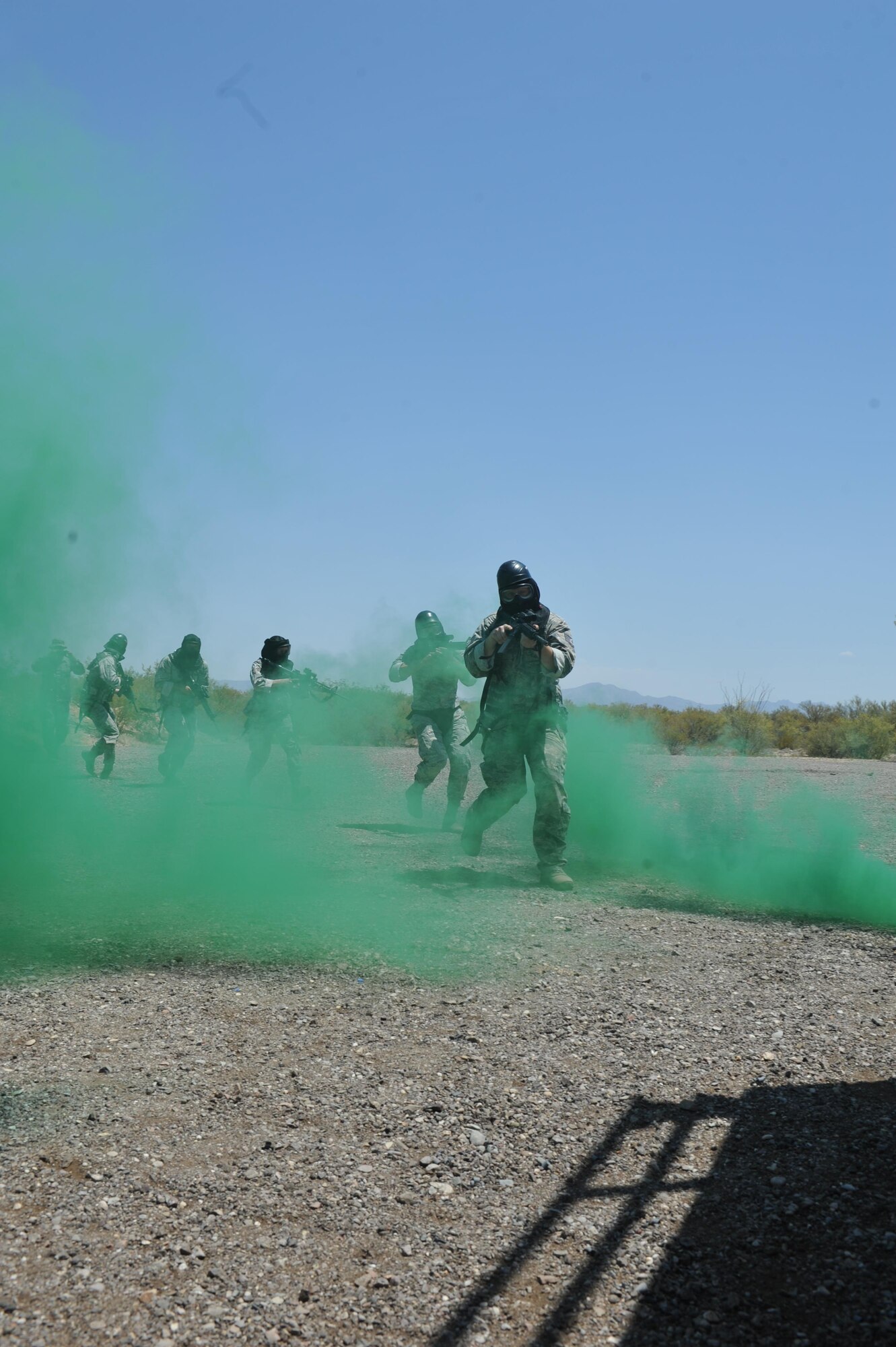 720th Security Forces Squadron members train in triple-digit heat during a drill weekend at Davis-Monthan Air Force Base, Ariz., June 4. They work alongside the 943rd Rescue Group to support active-duty and Air Force Reserve missions. Their parent unit is the 920th Mission Support Group at Patrick Air Force Base, Fla. (U.S. Air Force photo by Tech. Sgt. Carolyn Herrick)