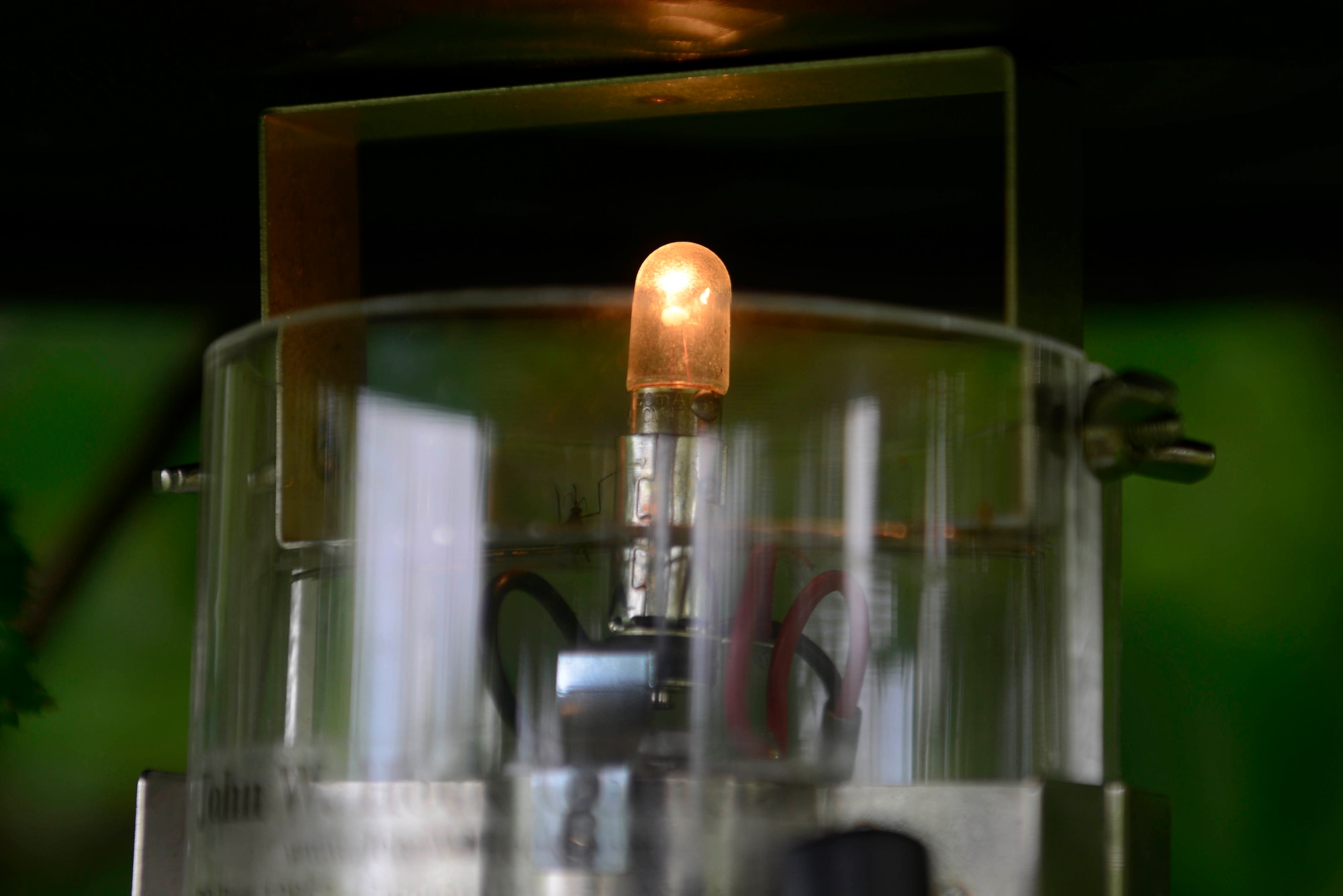 A mosquito is trapped by a fan in miniature light trap at Joint Base Elmendorf-Richardson, Alaska, July 7, 2016. (U.S. Air Force photo by Airman 1st Class Valerie Monroy)