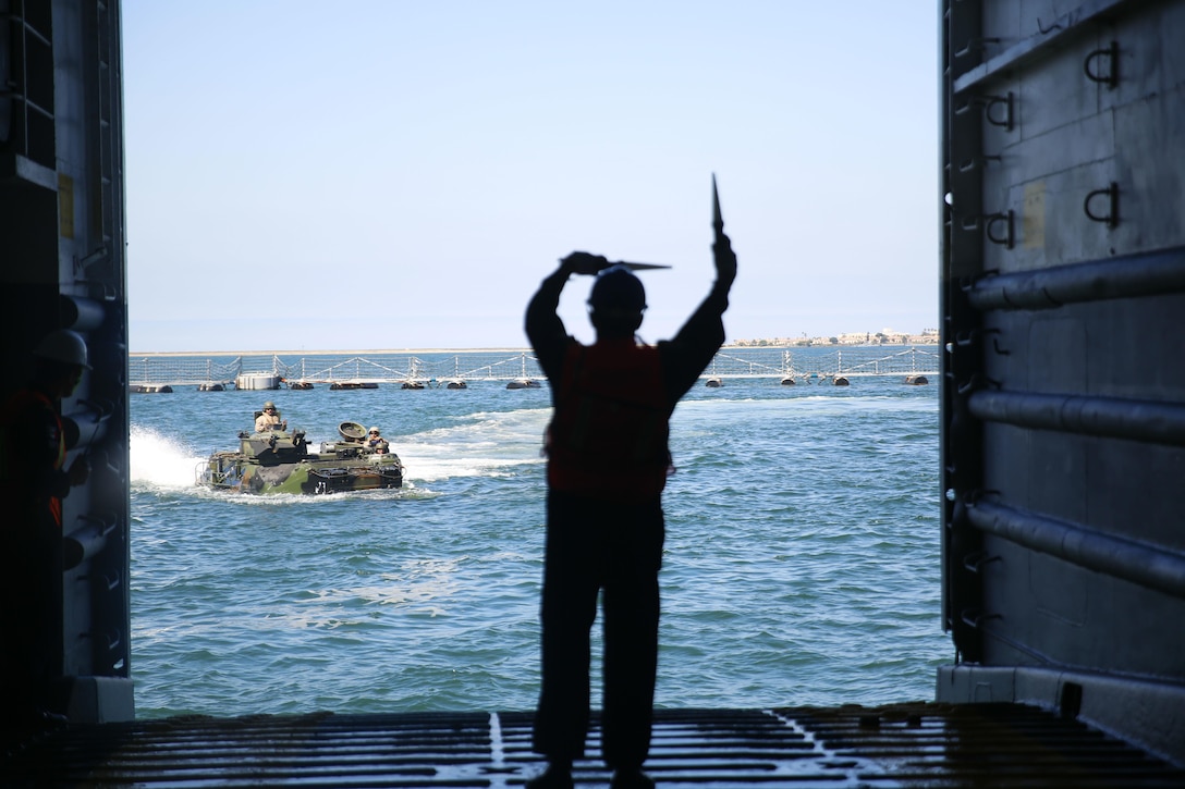 Mexican Navy 2nd Maestre CG Contramaestre Jose Antonio Morales guides a U. S. Marine amphibious assault vehicle toward the Mexican navy tank landing ship ARM Usumacinta (A-412) July 5, 2016. U.S. Marines assigned to Bravo Company, 3rd Amphibious Assault Battalion practiced AAV embarkation procedures with crewmembers of the Usumacinta (A-412) as part of the Rim of Pacific 2016 exercise.  Twenty-six nations, more than 40 ships and submarines, more than 200 aircraft and 25,000 personnel are participating in RIMPAC from June 30 to Aug. 4, in and around the Hawaiian Islands and Southern California. The world's largest international maritime exercise, RIMPAC provides a unique training opportunity that helps participants foster and sustain the cooperative relationships that are critical to ensuring the safety of sea lanes and security on the world's oceans. RIMPAC 2016 is the 25th exercise in the series that began in 1971. 