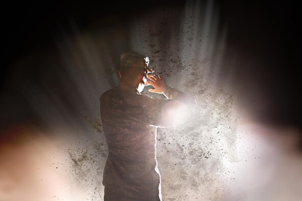 Explosive mechanisms accounted for 74.4 percent of combat casualties between the year 2005 to 2009, according to the United States Library of Medicine and National Institutes of Health. The photo depicts an Airman caught in an explosive-like scenario to represent retired Air Force Staff Sgt. Chris Campbell’s trials during his service in Iraq in 2005. (U.S. Air Force illustration by Airman 1st Class Caelynn Ferguson/Released)