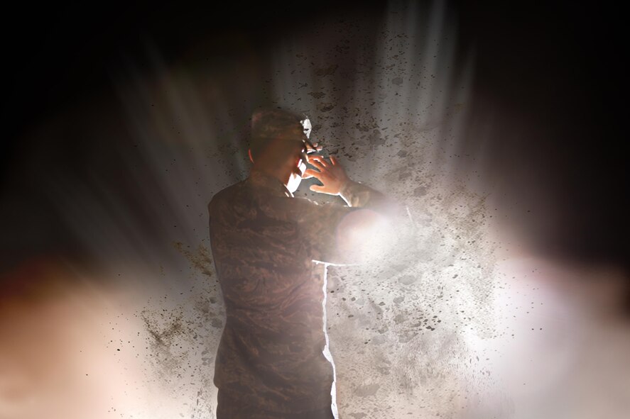 Explosive mechanisms accounted for 74.4 percent of combat casualties between the year 2005 to 2009, according to the United States Library of Medicine and National Institutes of Health. The photo depicts an Airman caught in an explosive-like scenario to represent retired Air Force Staff Sgt. Chris Campbell’s trials during his service in Iraq in 2005. (U.S. Air Force illustration by Airman 1st Class Caelynn Ferguson/Released)