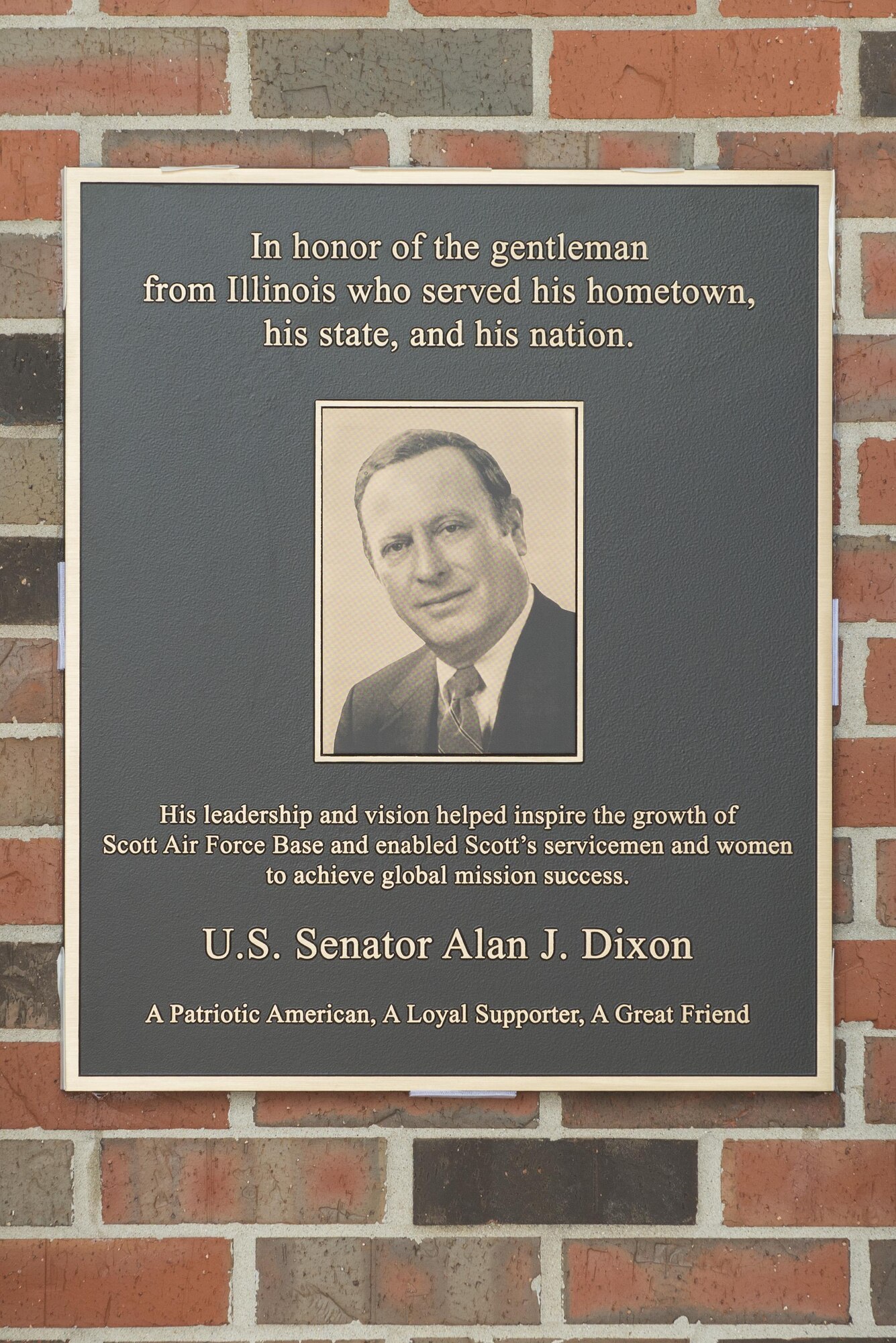 Ill. Sen. Alan J. Dixon’s wife, Jody Dixon, and son, Jeff Dixon, unveil a plaque during a dedication ceremony at the visitors control center at Scott Air Force Base, Ill., July 8, 2016. The visitor control center was dedicated to Dixon, who gave 43 years of public service to Scott AFB and the state of Ill.

(U.S. Air Force photo/ Senior Airman Kiana Brothers)
