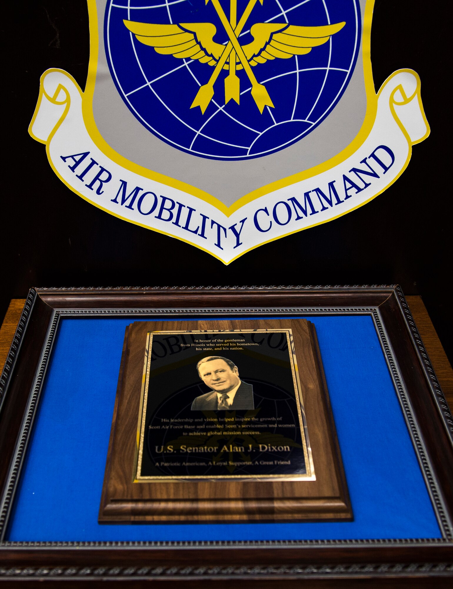 Former Ill. Sen. Alan J. Dixon is imprinted on a plaque that is to be presented to his family during his dedication ceremony at Scott Air Force Base, Ill., July 8, 2016.  The visitor center was dedicated to Dixon, who gave 43 years of public service to Scott AFB and the state of Ill. (U.S. Air Force photo by Jodi Martinez/Released)
