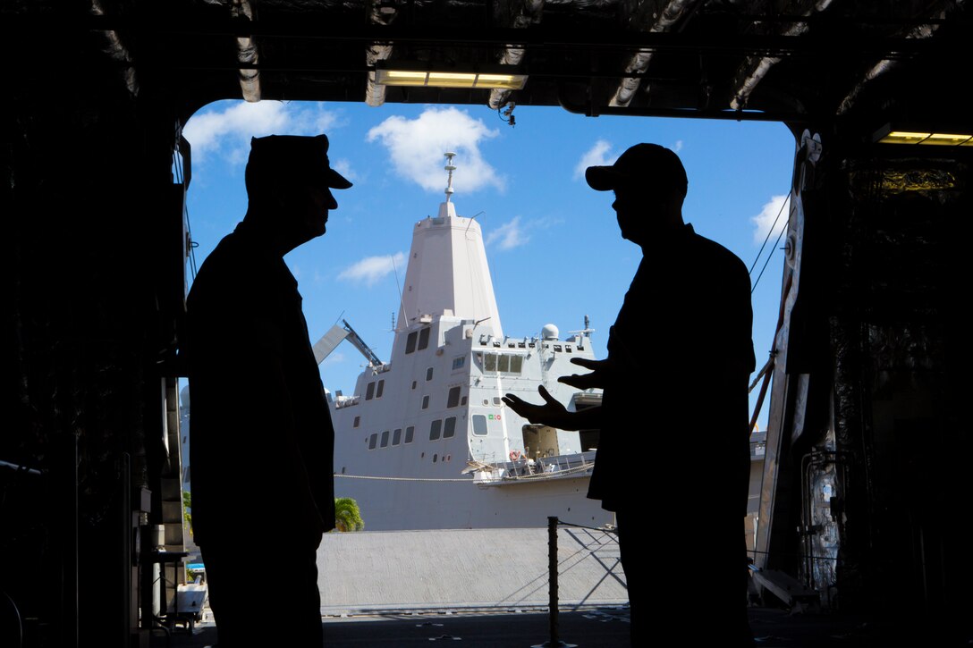 160708-M-QQ799-197 JOINT BASE PEARL HARBOR-HICKAM (July 8, 2016) Lt. Gen. John A. Toolan, U.S. Marine Corps Forces, Pacific commander, speaks with Cdr. Scott Larson, commanding officer, USS Coronado, on a visit to the ship during Exercise Rim of the Pacific 2016. Twenty-six nations, 49 ships, six submarines, about 200 aircraft, and 25,000 personnel are participating in RIMPAC from June 29 to Aug. 4 in and around the Hawaiian Islands and Southern California. The world’s largest international maritime exercise, RIMPAC provides a unique training opportunity while fostering and sustaining cooperative relationships between participants critical to ensuring the safety of sea lanes and security on the world’s oceans. RIMPAC 2016 is the 25th exercise in the series that began in 1971. 