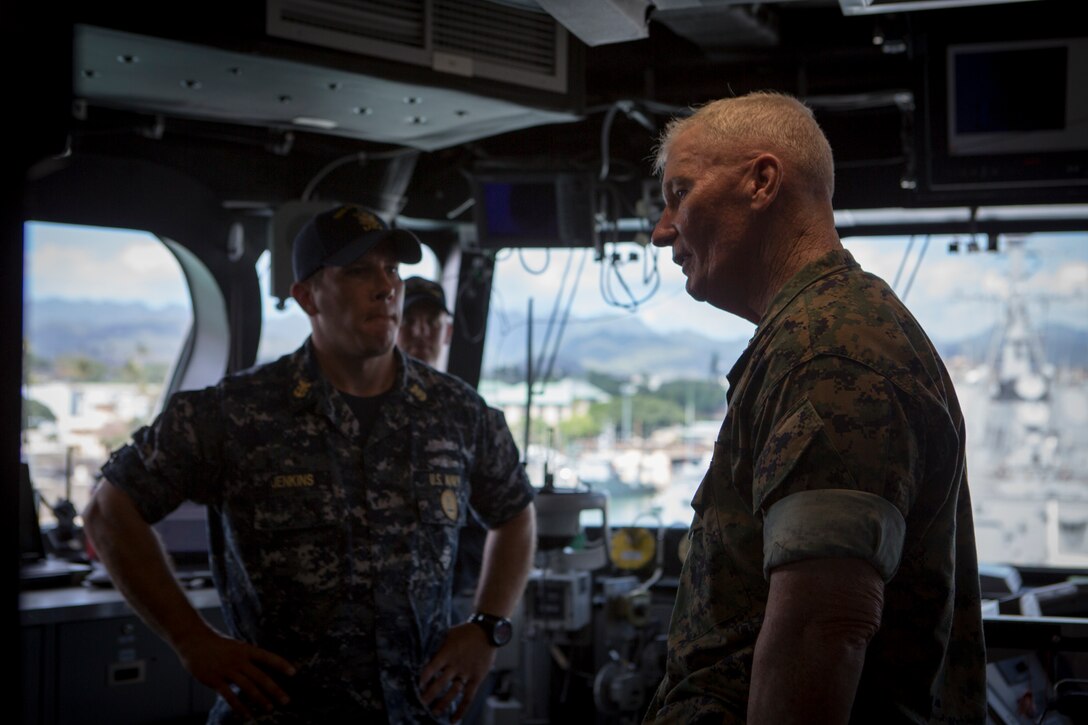 160708-M-QQ799-151 JOINT BASE PEARL HARBOR-HICKAM (July 8, 2016) Lt. Gen. John A. Toolan, U.S. Marine Corps Forces, Pacific commander, speaks with Command Master Chief Lucas Jenkins, USS Coronado, on a visit to the ship during Exercise Rim of the Pacific 2016. Twenty-six nations, 49 ships, six submarines, about 200 aircraft, and 25,000 personnel are participating in RIMPAC from June 29 to Aug. 4 in and around the Hawaiian Islands and Southern California. The world’s largest international maritime exercise, RIMPAC provides a unique training opportunity while fostering and sustaining cooperative relationships between participants critical to ensuring the safety of sea lanes and security on the world’s oceans. RIMPAC 2016 is the 25th exercise in the series that began in 1971.
