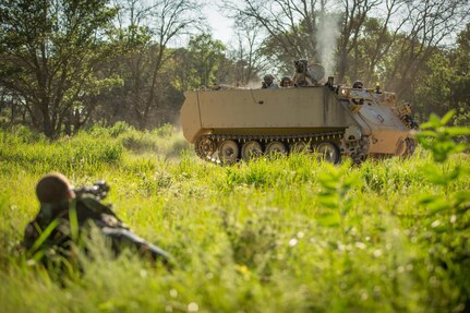 U.S. Army Spc. Josh Johnson, Bravo Company, 222nd Battalion, 1st Brigade Combat Team, 10th Mountain Division, engages a M113 Armored Personnel Carrier with a Rocket Propelled Grenade simulator during Warrior Exercise (WAREX) 86-16-03 at Fort McCoy, Wis., July 12, 2016. WAREX is an exercise designed to keep soldiers all across the United States ready to deploy. (U.S. Army photo by Sgt. Robert Farrell/Released).