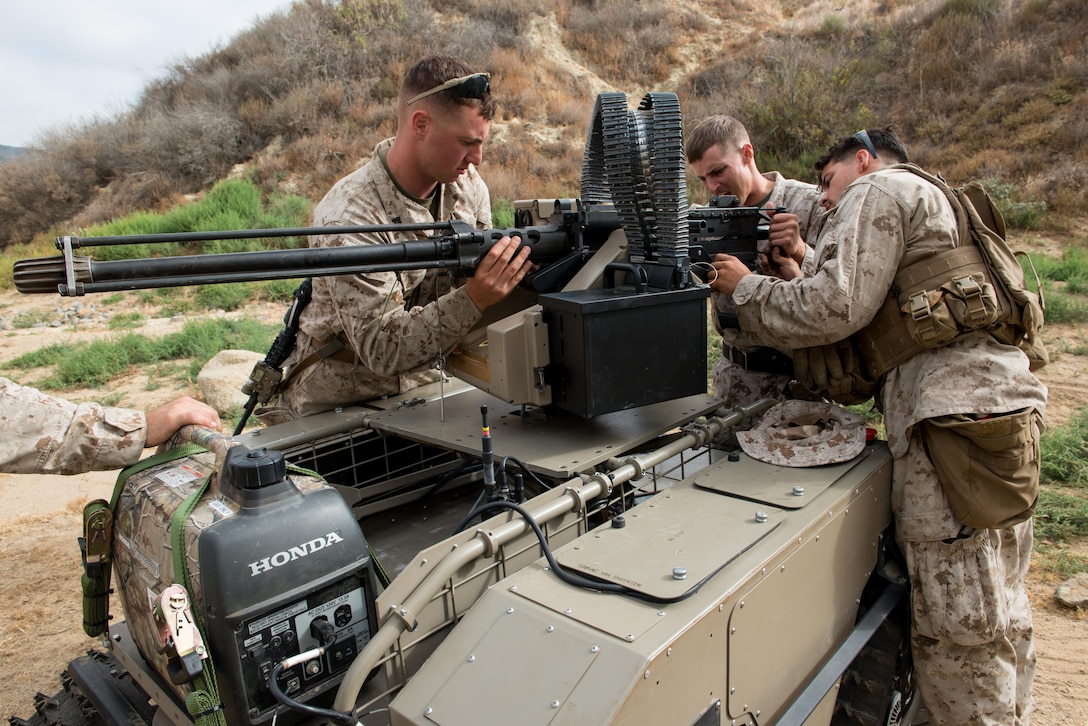 Marines with 3rd Battalion, 5th Marines Regiment prepare a newly developed system, the Multi Utility Tactical Transport, for testing at Marine Corps Base Camp Pendleton, Calif., July 8, 2016. The MUTT is designed as a force multiplier to enhance expeditionary power enabling Marines to cover larger areas and provide superior firepower with the lightest tactical footprint possible.  The Marine Corps Warfighting Laboratory is conducting a Marine Air-Ground Task Force Integrated Experiment in conjunction with Rim of the Pacific exercise to explore new gear and assess its capabilities for potential future use. The Warfighting Lab identifies possible challenges of the future, develops new warfighting concepts, and tests new ideas to help develop equipment that meets the challenges of the future operating environment.