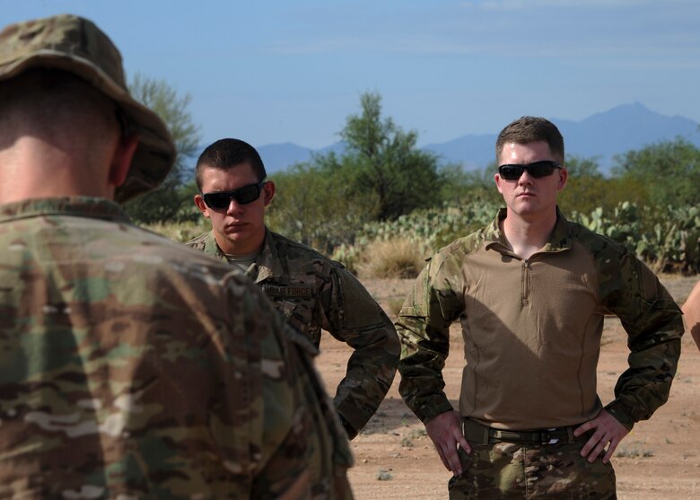 U.S. Air Force Staff Sgt. Michael McNally, 355th Maintenance Group scheduler, participates in a safety brief during an explosive ordnance disposal immersion course at Davis-Monthan Air Force Base, Ariz., June 28, 2016. The immersion course serves a dual purpose of showing the Airmen exactly what EOD technicians do on a regular basis and determining if the candidate is right for the job. (U.S. Air Force photo by Airman Nathan H. Barbour/Released)