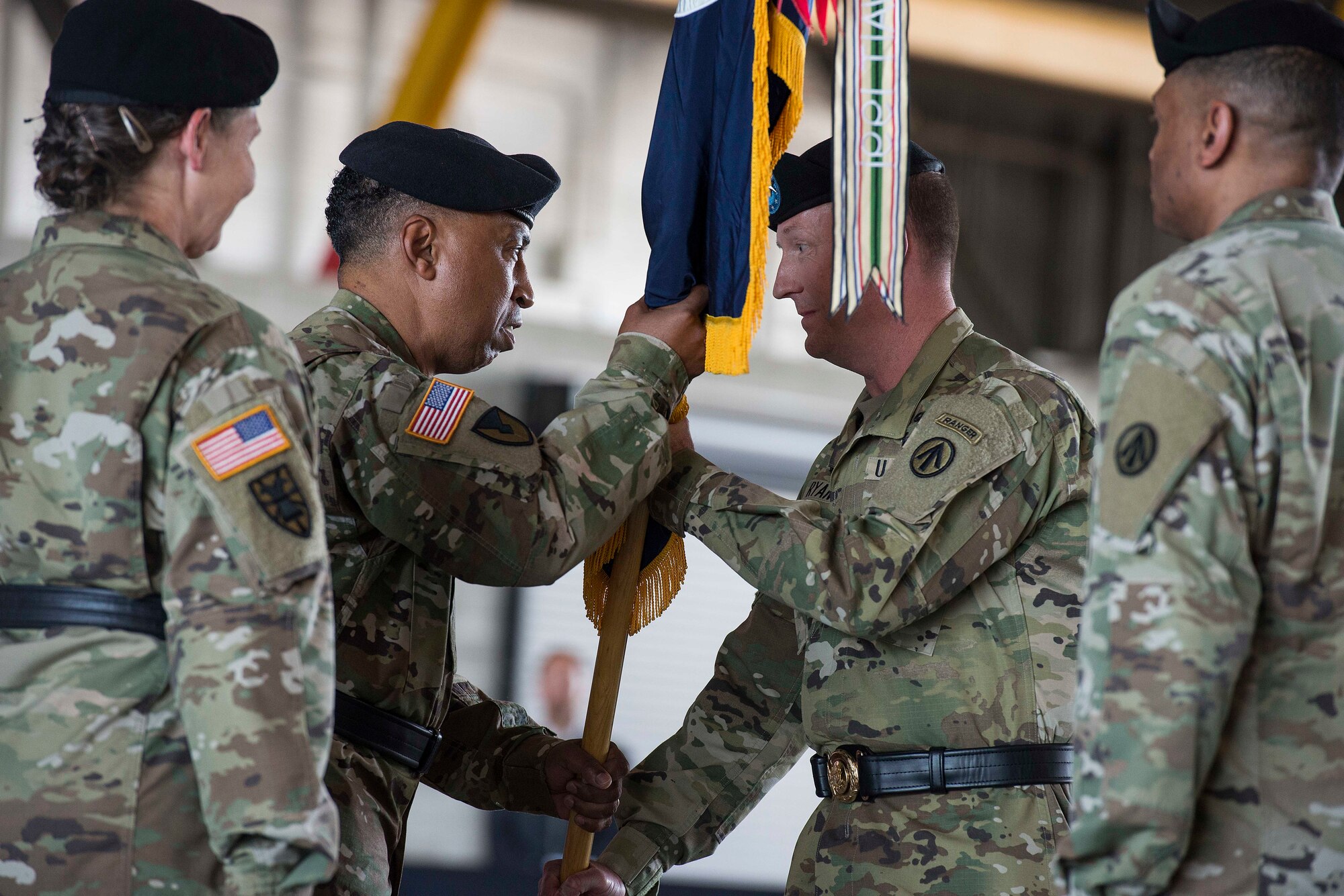 The Military Surface Deployment and Distribution Command held a change of command ceremony June 16, 2016 at Scott Air Force Base, Illinois. During the event, U.S. Army Maj. Gen. Susan A. Davidson relinquished command to U.S. Army Maj. Gen. Kurt J. Ryan. Ryan had previously served as the Chief of Ordnance and Ordnance School Commandant at Fort Lee, Virginia. As commander of SDDC, Ryan will lead nearly 2,400 military and civilian personnel responsible for planning and executing surface delivery of supplies and equipment in support of Department of Defense contingencies, exercises and humanitarian aid missions. Additionally, SDDC supports service members and their families by overseeing the shipment of their household goods and vehicles. (U.S. Air Force photo by Tech. Sgt. Jonathan Fowler)