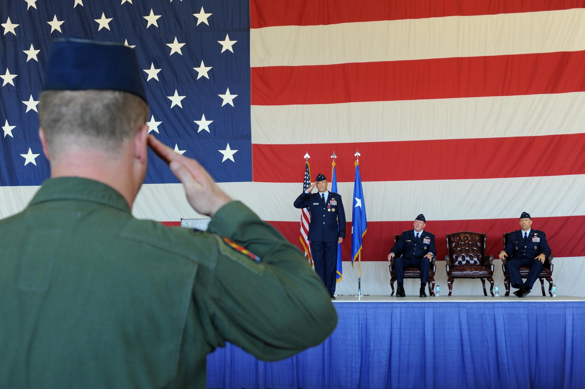 Brig. Gen. Scott Pleus, 56th Fighter Wing commander, receives his final salute from Col. David Shoemaker, 56th Fighter Wing vice commander, during the 56th FW change of command July 13, 2016 at Luke Air Force Base, Arizona. (U.S. Air Force photo by Airman 1st Class Pedro Mota)
