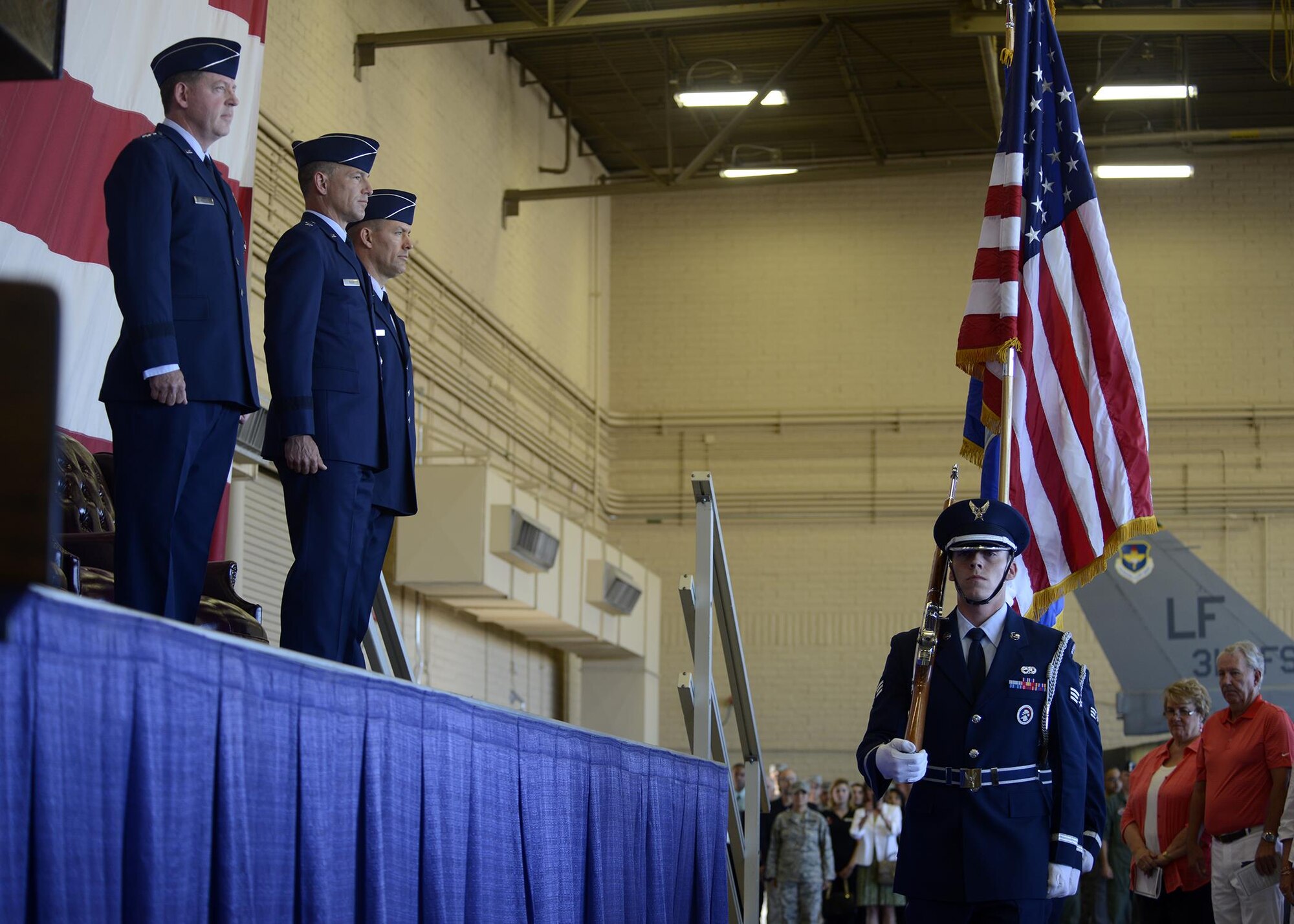 Members of the Luke Air Force Base honor guard prepare to present the colors during the 56th Fighter Wing Change of Command ceremony July 13, 2016 at Luke Air Force Base, Ariz. (U.S. Air Force photo by Senior Airman Devante Williams)