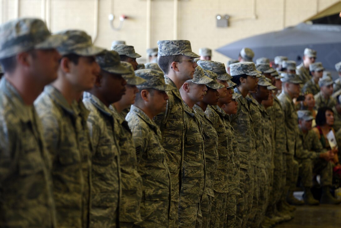Members of the 56th Fighter Wing stand at parade rest during the 56th Fighter Wing Change of Command ceremony July 13, 2016 at Luke Air Force Base, Ariz. (U.S. Air Force photo by Senior Airman Devante Williams)