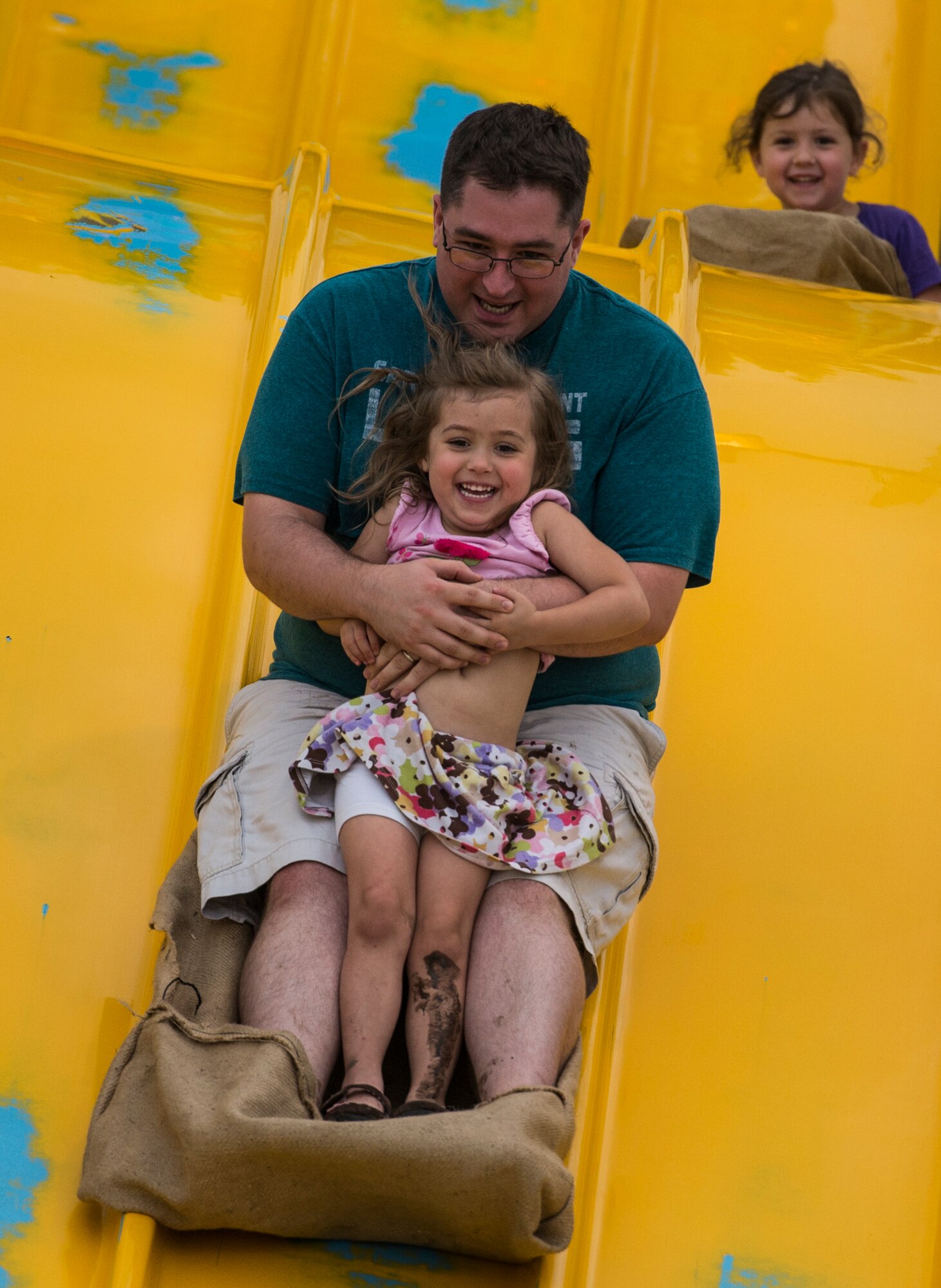Despite the rainy weekend, thousands made it to the Old Fashioned 4th of July Celebration at Scheve Park, which featured carnival rides, live bands, food and craft booths, softball and kickball tournaments, games, raffles, poker and a fireworks show, Mascoutah, Ill., July 4, 2016.  Col. Terrence Adams, 375th Communications Group commander, spoke to spectators during the event in remembrance of Independence Day.  Following Adams, the U.S. Air Force Band of Mid-America’s Roots in Blue played favorite classics and current hits until fireworks lit the night sky. (U.S. Air Force photo by Staff Sgt. Jodi Martinez/Released)