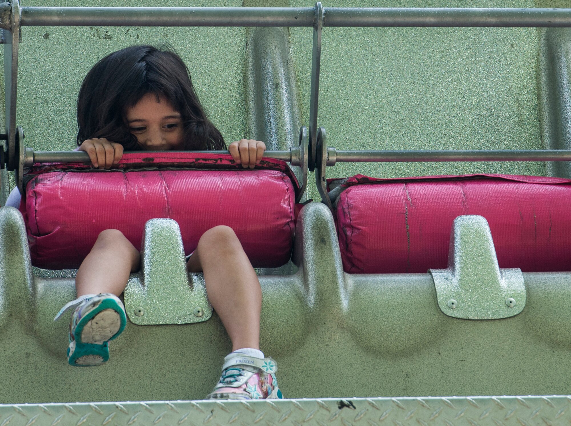 Despite the rainy weekend, thousands made it to the Old Fashioned 4th of July Celebration at Scheve Park, which featured carnival rides, live bands, food and craft booths, softball and kickball tournaments, games, raffles, poker and a fireworks show, Mascoutah, Ill., July 4, 2016.  Col. Terrence Adams, 375th Communications Group commander, spoke to spectators during the event in remembrance of Independence Day.  Following Adams, the U.S. Air Force Band of Mid-America’s Roots in Blue played favorite classics and current hits until fireworks lit the night sky. (U.S. Air Force photo by Staff Sgt. Jodi Martinez/Released)