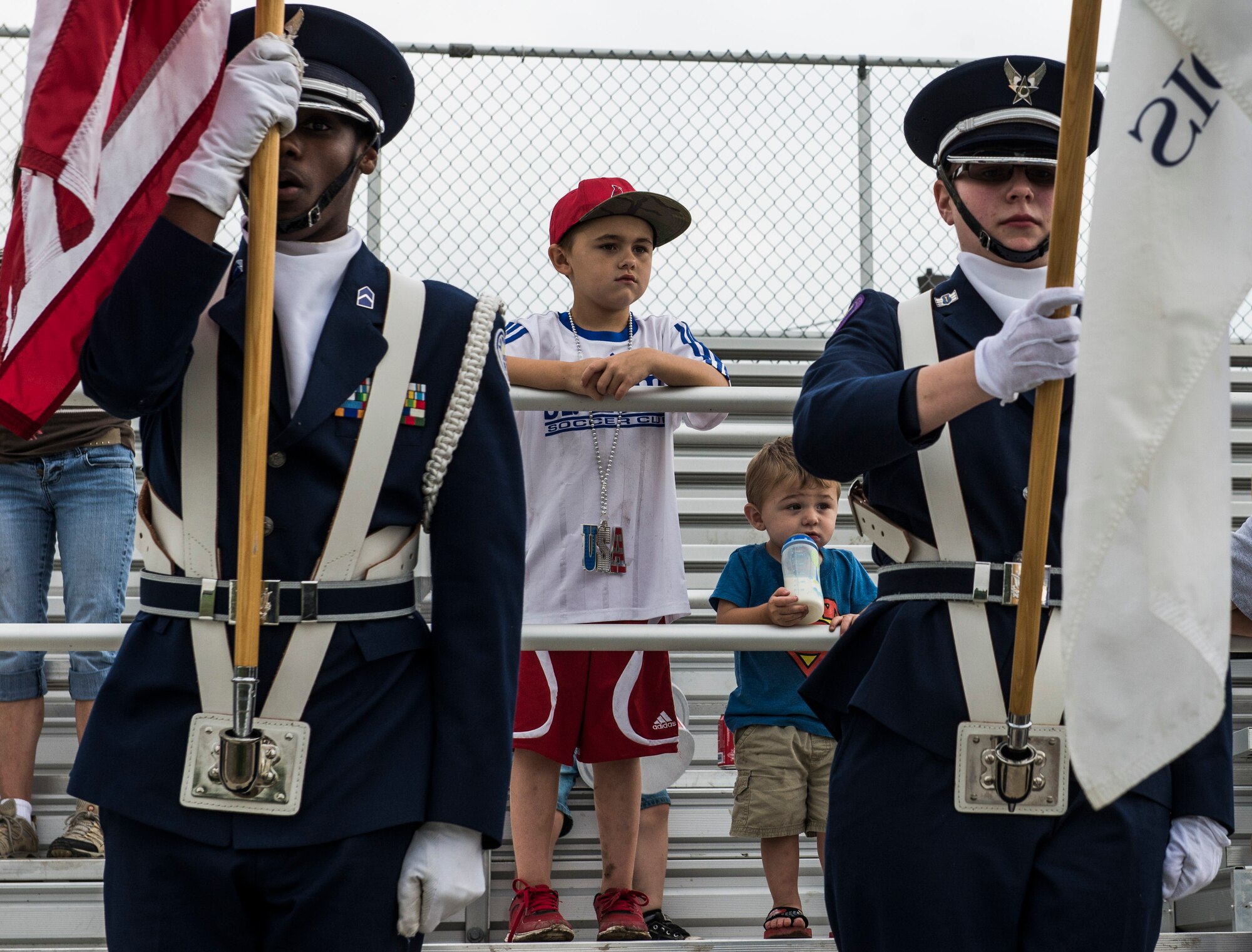 Despite the rainy weekend, thousands made it to the Old Fashioned 4th of July Celebration at Scheve Park, which featured carnival rides, live bands, food and craft booths, softball and kickball tournaments, games, raffles, poker and a fireworks show, Mascoutah, Ill., July 4, 2016.  Col. Terrence Adams, 375th Communications Group commander, spoke to spectators during the event in remembrance of Independence Day.  Following Adams, the U.S. Air Force Band of Mid-America’s Roots in Blue played favorite classics and current hits until fireworks lit the night sky. (U.S. Air Force photo by Staff Sgt. Jodi Martinez/Released)