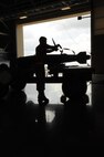 Senior Airman Erik Ortiz, 96th Aircraft Maintenance Unit Crew Cobra 1 member, inspects and secures munitions during a weapons load competition at Barksdale Air Force Base, La., July 8, 2016. One Crew per AMU are selected based on their loading stats for the quarter. (U.S. Air Force Photo/Airman Alexis C. Frost)