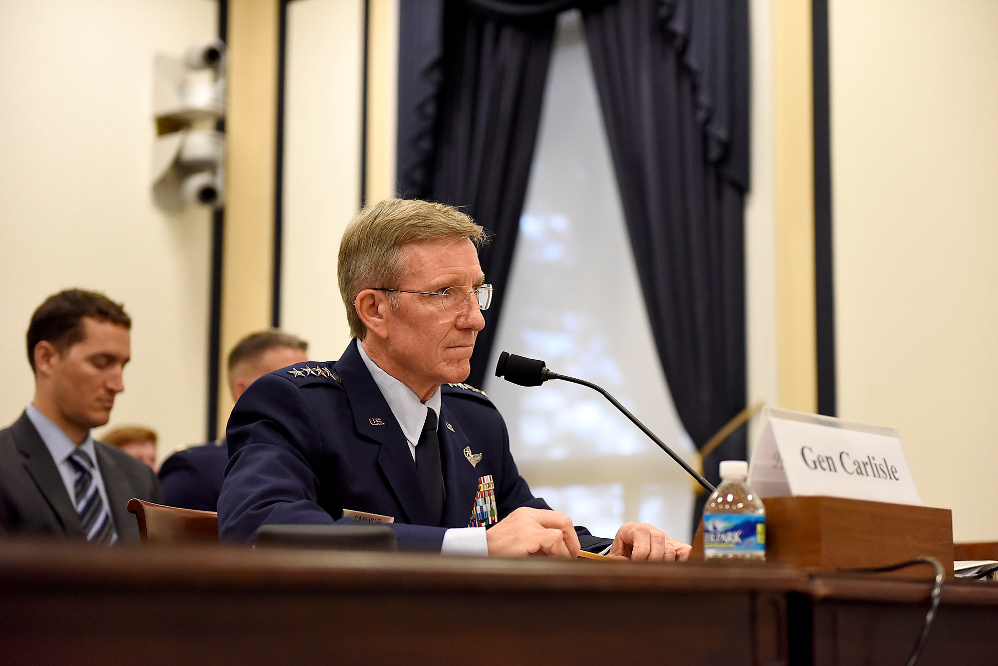 U.S Air Force Gen. Hawk Carlisle, commander of Air Combat Command, engages with the House Armed Services Subcommittee on Tactical Air and Land Forces during a hearing in Washington, D.C., July 13, 2016. The purpose of his testimony involved the importance of air superiority and the need to assure it by modernizing the Combat Air Force. (U.S. Air Force photo/Senior Airman Hailey Haux) 