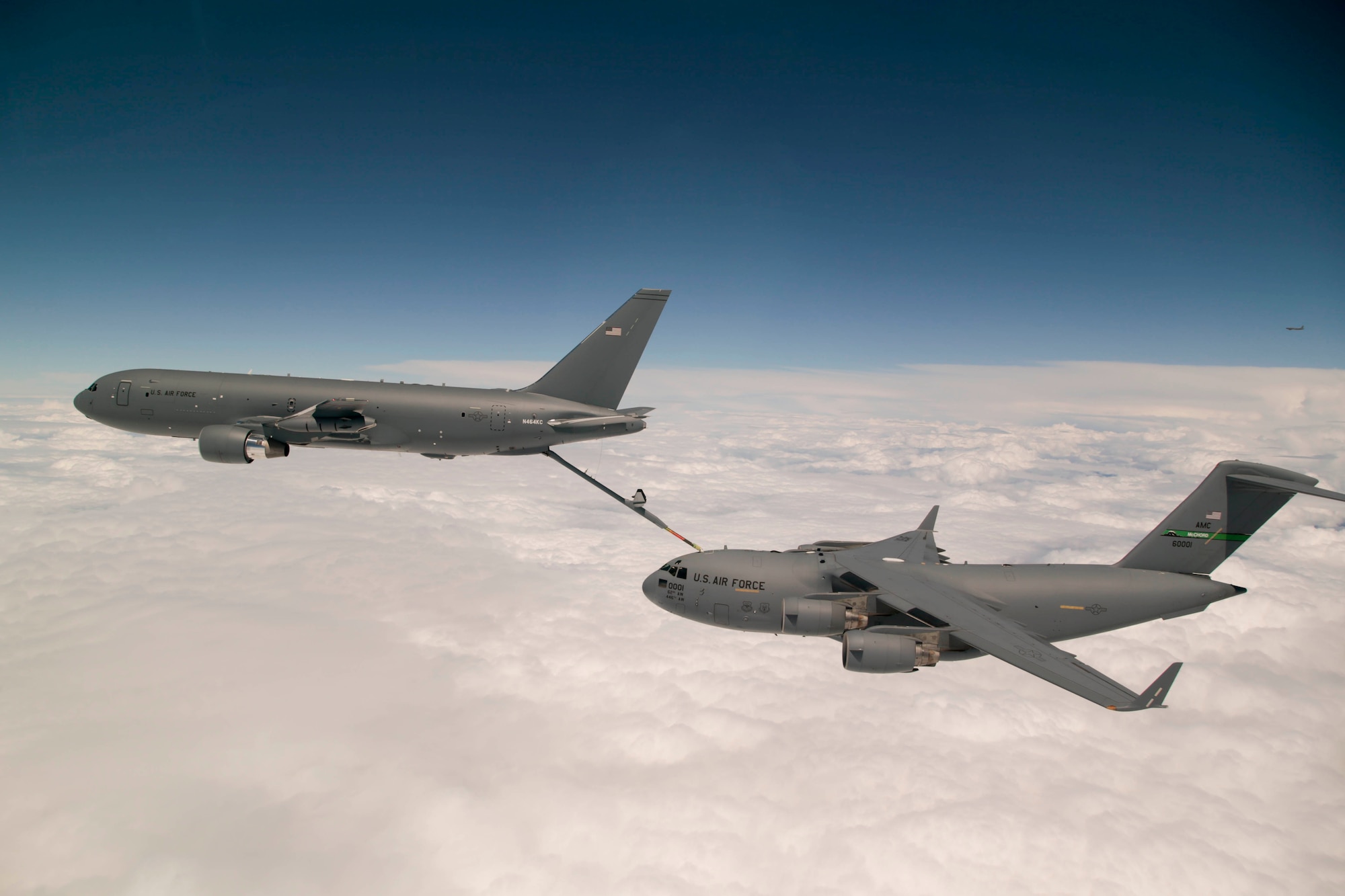 Boeing's KC-46 aerial refueling tanker conducts receiver compatibility tests with a U.S. Air Force C-17 Globemaster III from Joint Base Lewis-McChord as part of Test 003-06. The event marks the nearing completion of "Milestone C" in the new tanker's developmental testing stage. (U.S. Air Force photo by Christopher Okula)