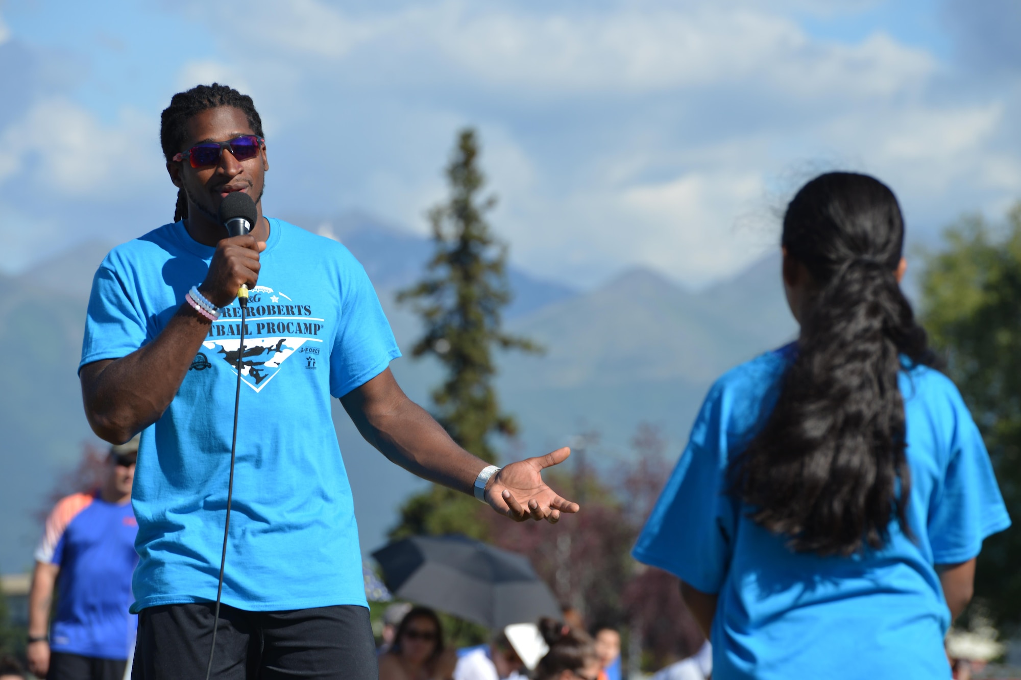 Andre Roberts, a wide receiver with the Detroit Lions, answers audience questions at the Military ProCamp at Joint Base Elmendorf-Richardson, Alaska, June 12, 2016. Roberts shared some inspiring words and he stressed the importance of hard work and dedication. (U.S. Air Force photo by Airman 1st Class Javier Alvarez)