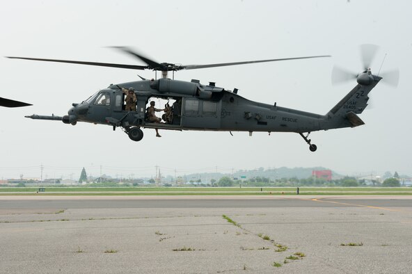 An HH-60G Pave Hawk assigned to the 33rd Rescue Squadron takes off during Exercise Pacific Thunder 16-2 at Osan Air Base, Republic of Korea, July 12, 2016. The 33rd RQS is participating in Pacific Thunder, the largest Pacific combined joint exercise in which U.S. and ROK forces train and test combat search and rescue skills. (U.S. Air Force photo by Staff Sgt. Jonathan Steffen/Released) 