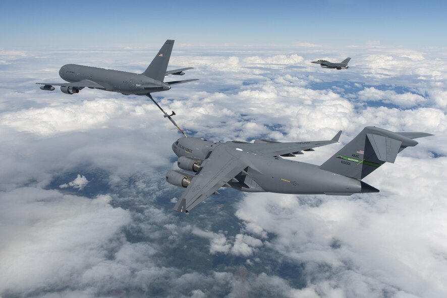 The KC-46 Pegasus refuels a C-17 Globemaster III July 12.  The successful mission tested the hydraulic pressure relief valves installed to correct higher-than-expected axial loads in the boom.  (Boeing photo by Paul Weatherman)

