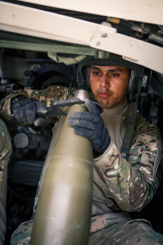 Army Staff Sgt. Salvador Villegas prepares rounds for an M109A6 Paladin howitzer at Al-Taqaddum Air Base, Iraq, June 27, 2016, to support Operation Inherent Resolve. Marine Corps photo by Sgt. Donald Holbert
