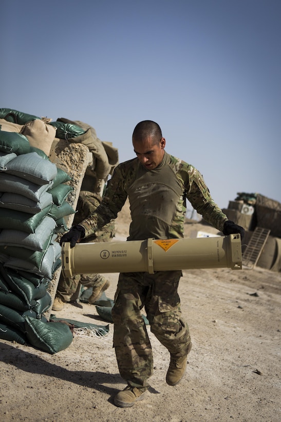 Army Sgt. Kevin Garcia conducts a resupply of artillery rounds for an M109A6 Paladin howitzer after a fire mission at Al-Taqaddum Air Base, Iraq, June 27, 2016, to support Operation Inherent Resolve. Garcia is a gunner assigned to Battery C, 4th Battalion, 1st Field Artillery Regiment, 1st Armored Division, Task Force Al Taqaddum. Marine Corps photo by Sgt. Donald Holbert