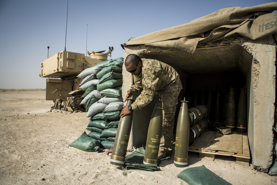 Army Pvt. Ismael Gallardo conducts a resupply of artillery rounds after a fire mission at Al-Taqaddum Air Base, Iraq, June 27, 2016, to support Operation Inherent Resolve. Gallardo is an M109A6 Paladin howitzer driver assigned to the 4th Battalion, 1st Field Artillery Regiment, 1st Armored Division, Task Force Al Taqaddum. Marine Corps photo by Sgt. Donald Holbert