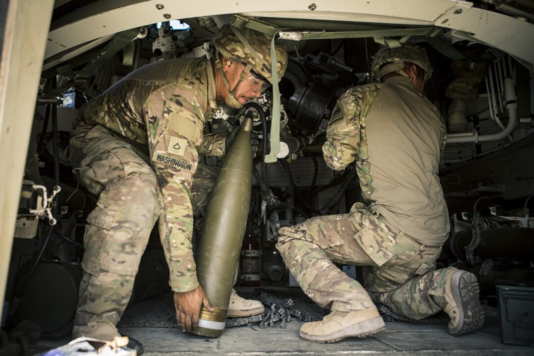 Soldiers reload an M109A6 Paladin howitzer during a fire mission at Al-Taqaddum Air Base, Iraq, June 27, 2016. The strikes supported Operation Inherent Resolve, the operation aimed at eliminating the Islamic State of Iraq and the Levant terrorist group and the threat it poses to Iraq, Syria and the wider international community. Marine Corps photo by Sgt. Donald Holbert