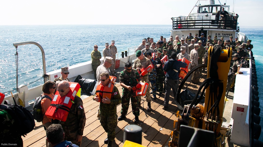Senior U.S. and foreign military leaders prepare to embark the USNS John Glenn, not shown, during the USPACOM Amphibious Leaders Symposium off the coast of U.S. Marine Corps Base Camp Pendleton, Calif., July 13, 2016. PALS brings together senior leaders of allied and partner nations from the Indo-Asia Pacific region to discuss key aspects of maritime/amphibious operations, capability development, crisis response, and interoperability. Twenty-two allied and partnered nations, including the U.S. are participating. 