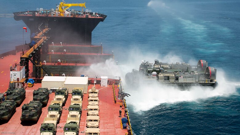 Senior U.S. and foreign military leaders, not shown, observe a Landing Craft Air Cushion disembark the USNS John Glenn during an amphibious assault demonstration during the USPACOM Amphibious Leaders Symposium at sea off the coast of U.S. Marine Corps Base Camp Pendleton, Calif., July 13, 2016. PALS brings together senior leaders of allied and partner nations from the Indo-Asia Pacific region to discuss key aspects of maritime/amphibious operations, capability development, crisis response, and interoperability. Twenty-two allied and partnered nations, including the U.S. are participating.